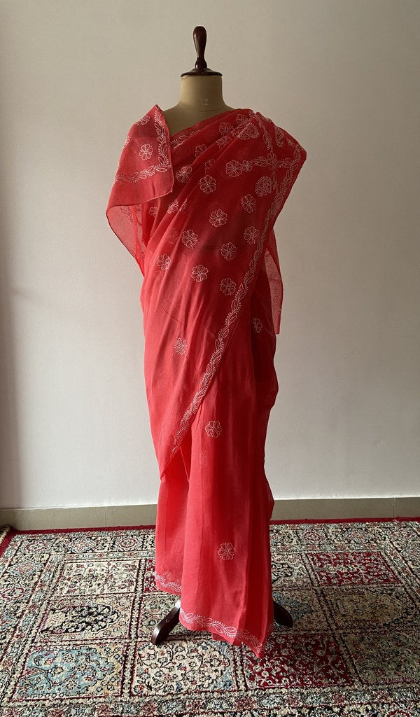 Red cotton voile chikankari saree draped on the mannequin