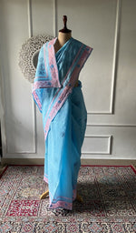 Load image into Gallery viewer, Sky blue cotton voile chikankari saree draped on the mannequin