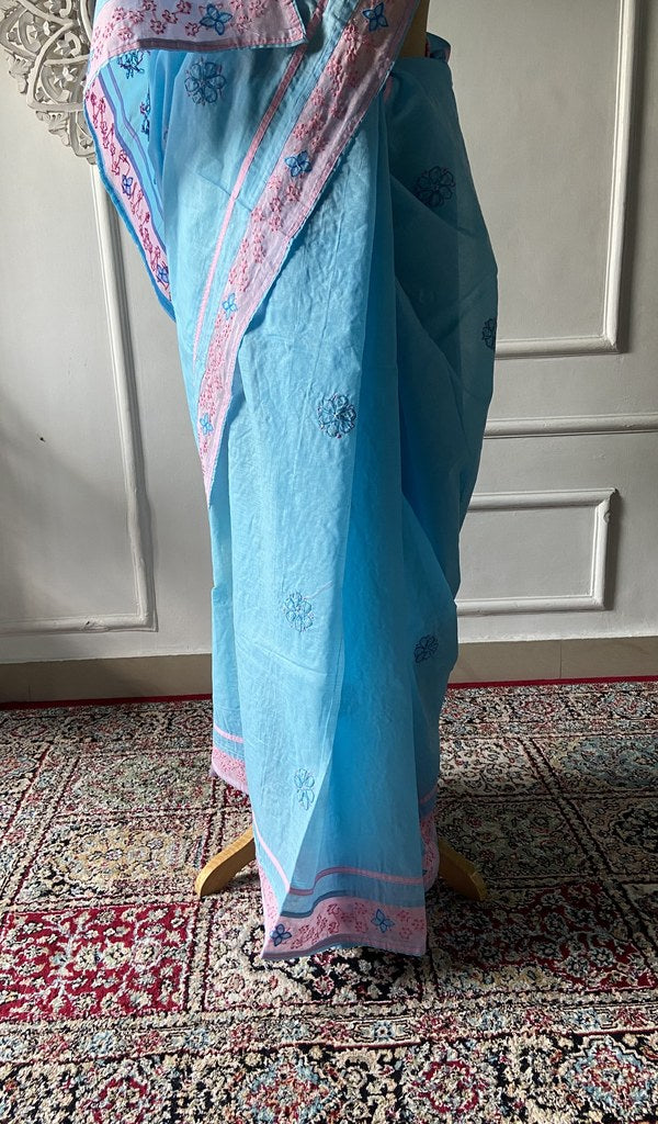 Pallu of the sky blue saree, chikankari worked across it