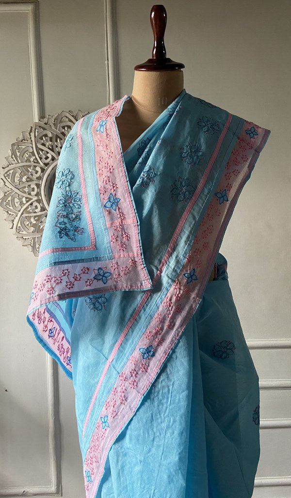 Border detail on the sky blue cotton voile saree