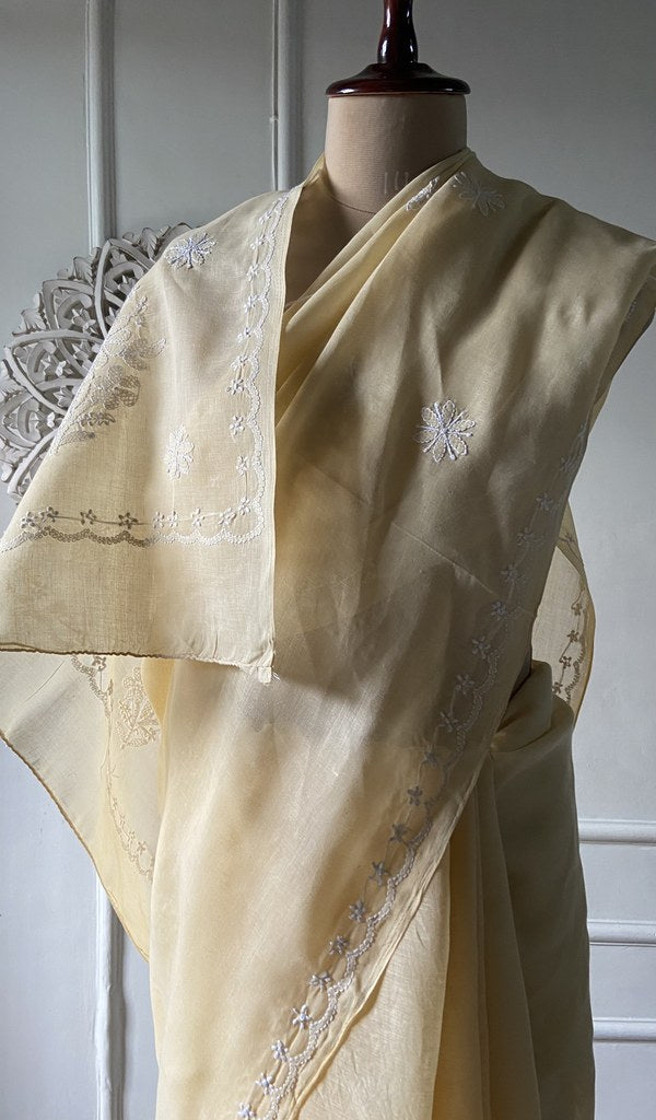 Chikankari and border together on the pale yellow saree