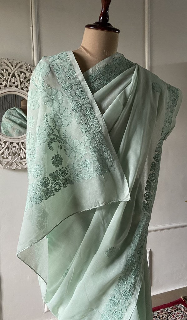 Pallu of the sea green saree, chikankari worked across it