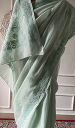 Load image into Gallery viewer, Chikankari on the pallu, seen close