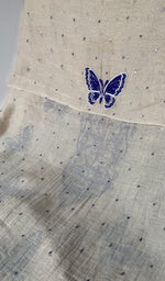 The kurta piece folded on the carpet