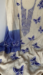Fine chikankari with butterfly motifs highlighted across the body of the kurta piece