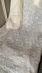 Chikankari worked by hand on mul chanderi
