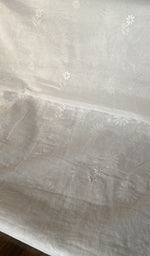Close view of the white kurta fabric