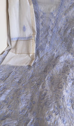Powder blue mul chanderi laid flat on the table