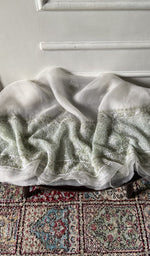 fabric laid out, off white pure organza silk