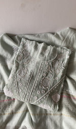 Green pure mul chanderi kurta piece folded, fine front and back jaaldar chikankari anarkali