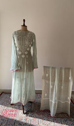 The set on the mannequin with its dupatta beside it