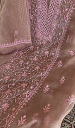 Dusty rose organza silk laid out flat