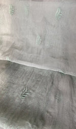 Close view of the mint green kurta fabric