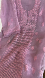 Lilac organza silk laid out flat