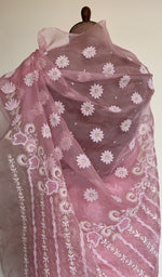 Embroidery on the pink saree, close view