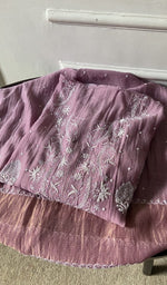 border and hem of the purple kurta piece