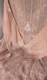 Hem and border of the peach dupatta