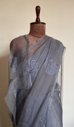 Grey saree on the mannequin, close view