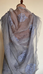 Embroidery on the grey saree, close view