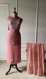 The set on the mannequin with its dupatta beside it