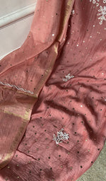 Badla work and beadwork across the body of the kurta piece