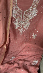Beads and cutdana along the placket