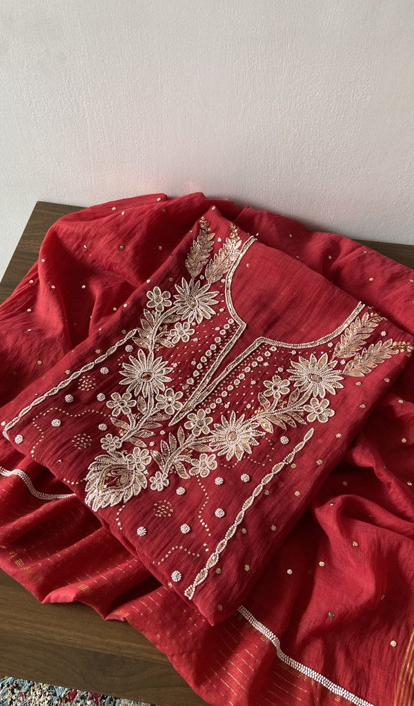 Red pure mul chanderi kurta piece folded, badla work and beadwork