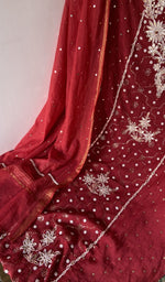 The kurta piece folded on the carpet