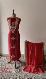 The set on the mannequin with its dupatta beside it