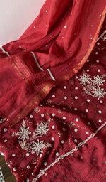 Beads and cutdana along the placket