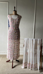 The set on the mannequin with its dupatta beside it