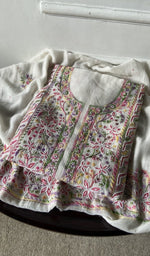 The folded set, kurta on top