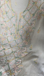 fine multicoloured panel chikankari with matching beads sequ across the body of the kurta