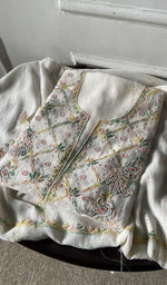 The folded set, kurta on top