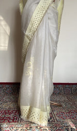 Saree draped on the mannequin, side view