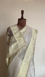 White saree on the mannequin, close view