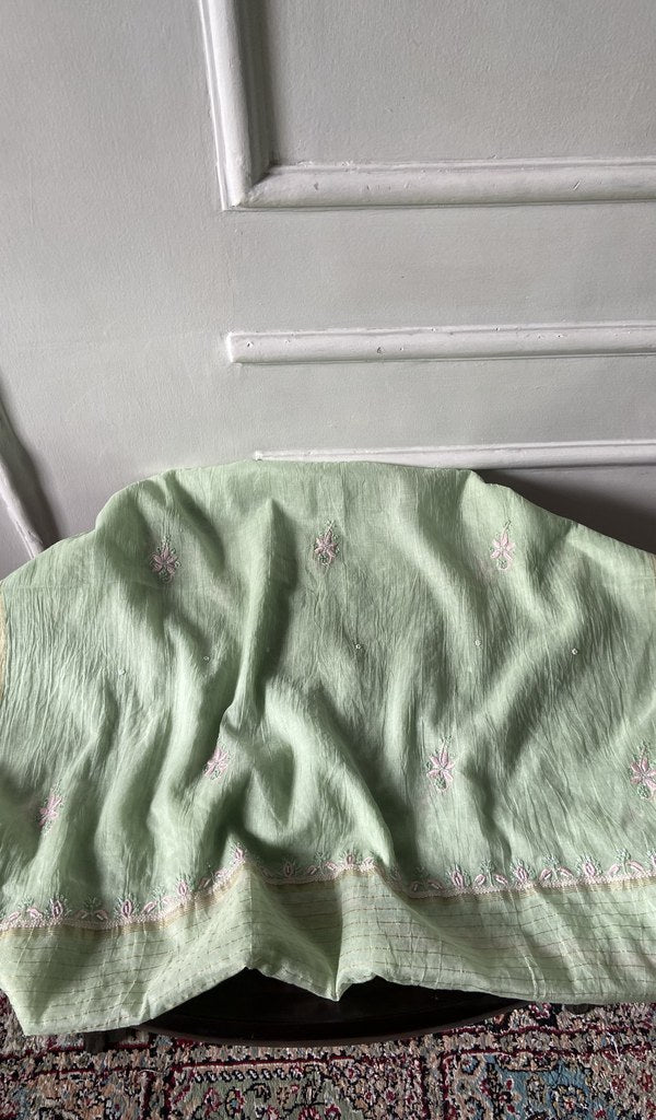 Mint green pure mul chanderi laid over the stool