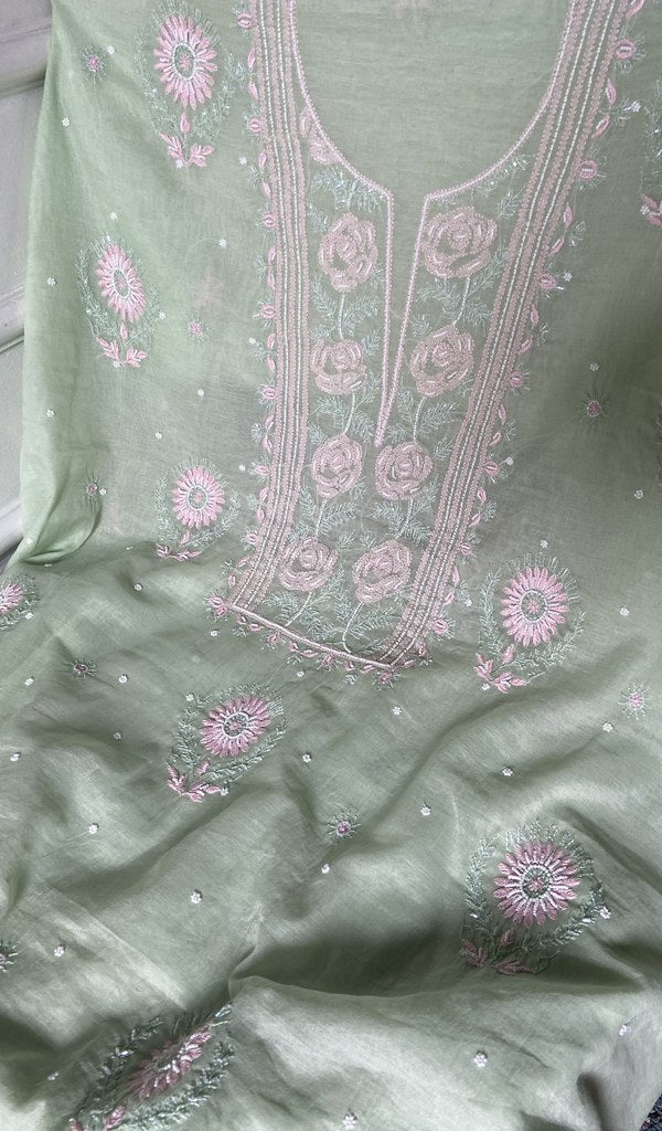 Close view of the chikankari on the mint green kurta