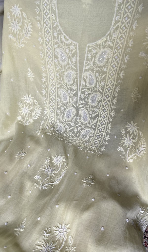 Close view of the chikankari on the ivory kurta