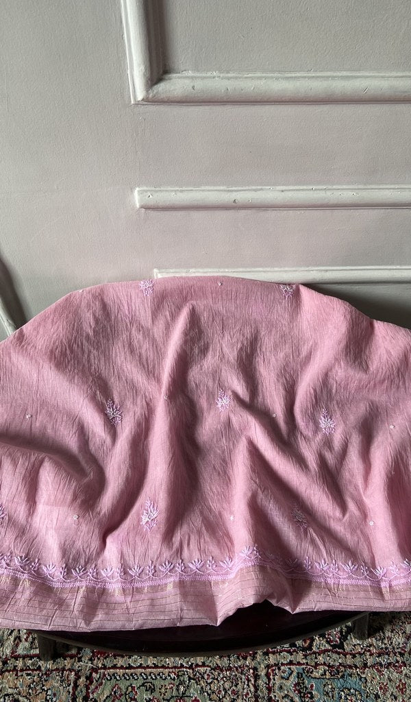Blush pink pure mul chanderi laid over the stool