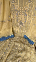 Motifs across the body of the yellow kurta