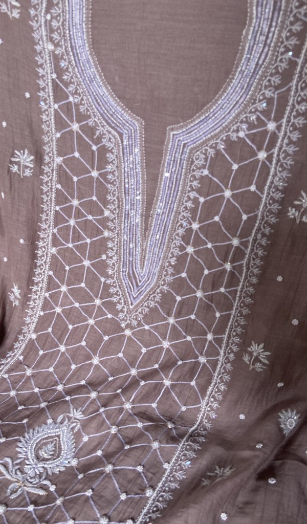 close view of the hand embroidery, mauve brown pure mul chanderi