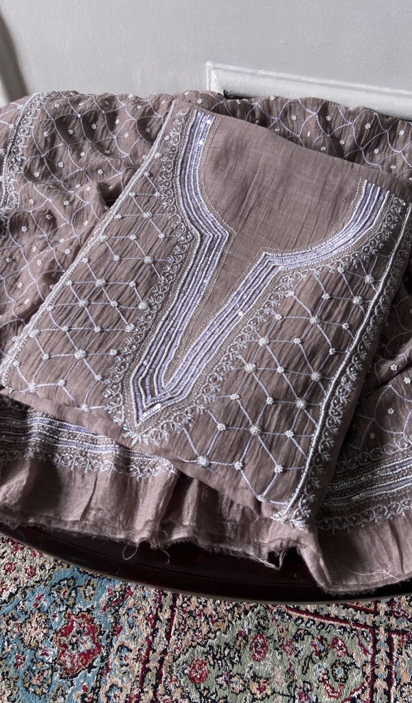 mauve brown chikankari set folded, worked panel on top