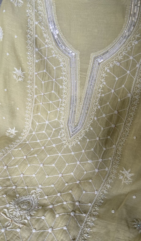 close view of the hand embroidery, pale yellow pure mul chanderi