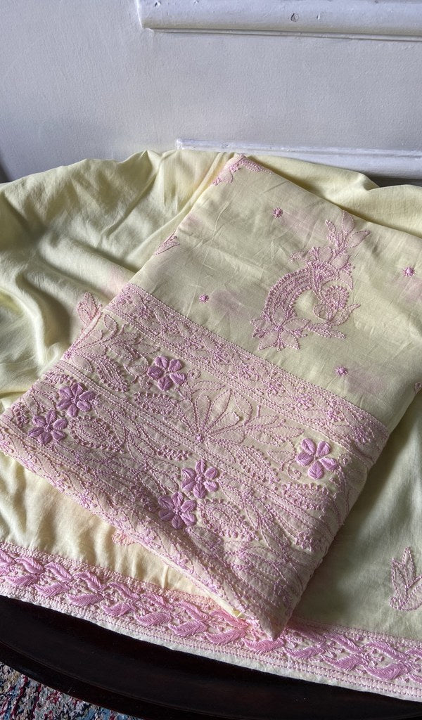 pale yellow chikankari set folded, worked panel on top