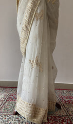 back of the off white chikankari saree