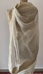 side view of the off white pure organza silk saree