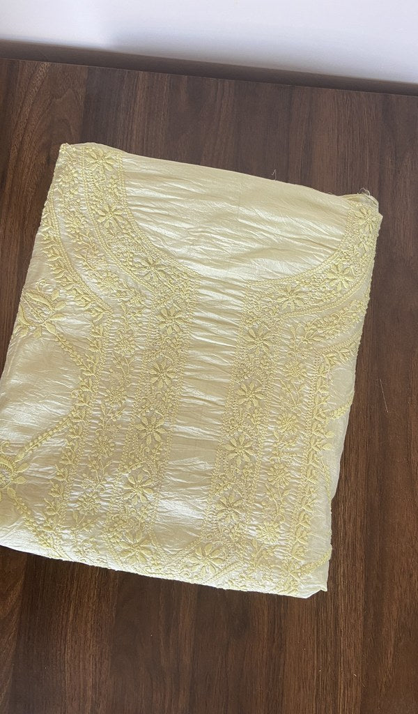 Folded lemon yellow tussar silk kurta, gala and neckline work