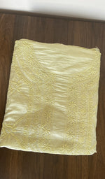 Folded lemon yellow tussar silk kurta fabric, second view