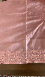 Close view of the salmon pink kurta fabric
